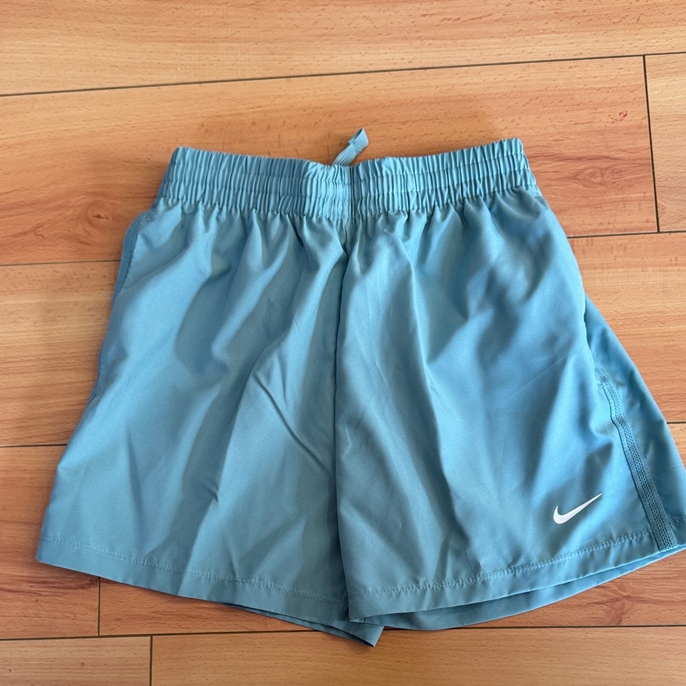 Nike Kids Standard Fit Dri-Fit teal shorts